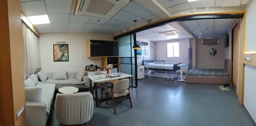 Wide view of the VIP suite at Pluto Hospital